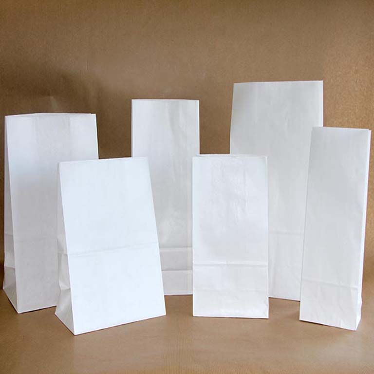 BOLSA PAPEL BLANCO 17X6X32 CON FUELLE PAQUETE 100 UNIDADES